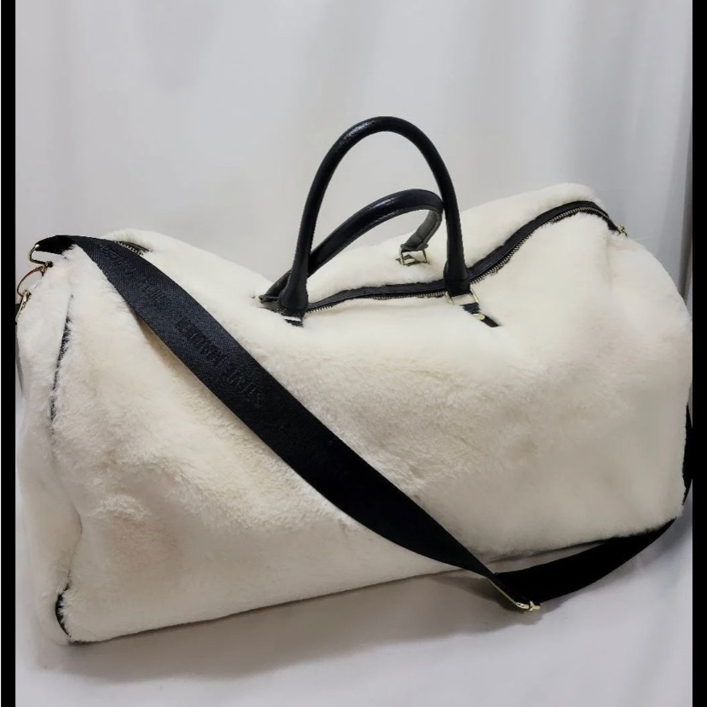 Steve Madden cream faux fur weekend bag